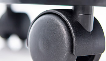 Running rollers for high manoeuvrability, mounted on barrel vacuums